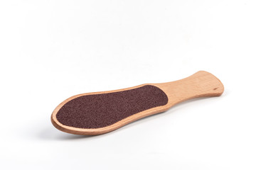 Wooden foot file on a white background