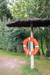 Life buoy near a pool in case of emergency.