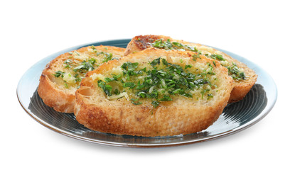 Slices of toasted bread with garlic and herb on white background