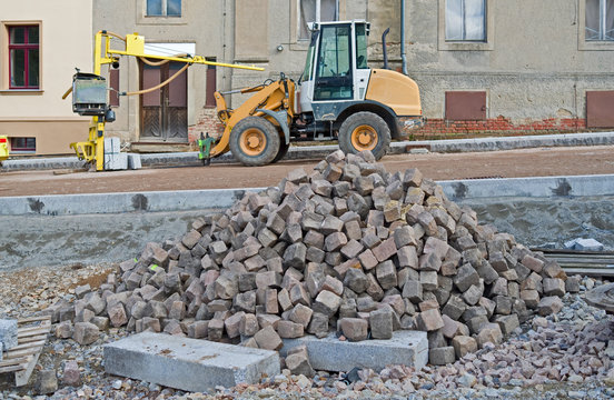 Road Construction / Germany: Cobblestone piles on the edge of a road construction site in the New Federal States