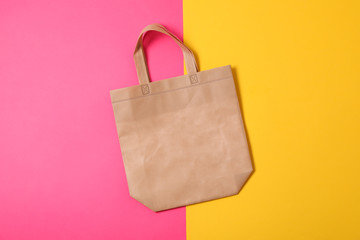 Eco bag on two color background, space for text