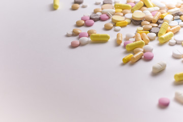 colorful pills on white background