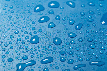 Blue water drops background