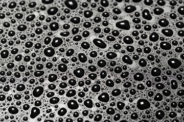 abstract water drops on a dark black  background