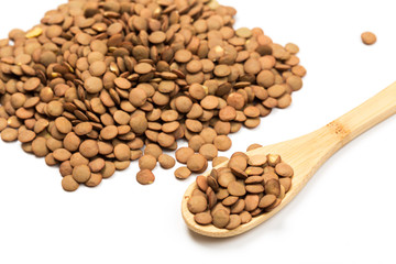 Pile lentil isolated on white background. Top view.