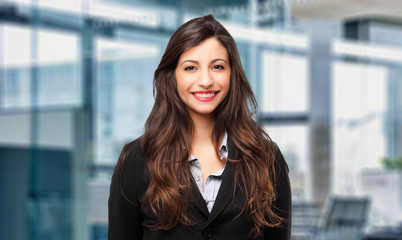 Fototapeta premium Smiling young female manager portrait