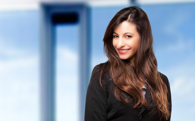 Fototapeta premium Smiling young female manager portrait