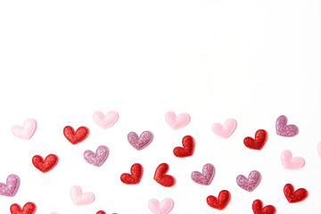 Hearts on a white background top view. Holiday background for Valentine's Day.