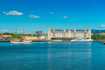 Obraz premium Cityscape of Oslo viewed from the sea, Norway. Skyline of a port city on summer sunny day