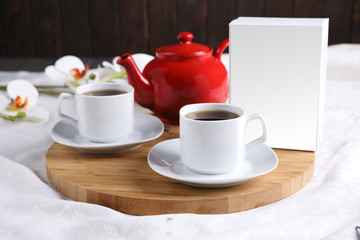 Fototapeta na wymiar candle light tea set with red kettle