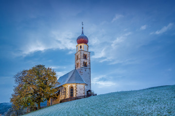 Church of Saint Valentine on a snowy day, Seis am Schlern, Siusi allo Sciliar, Dolomites,...