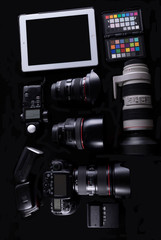 Fototapeta na wymiar Photographic equipment, camera, lenses and accessories.