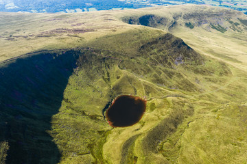 Aerial drone view of the twin peaks of mountains Corn Du and Pen-y-Fan in the Brecon Beacons of Wales, UK - obrazy, fototapety, plakaty