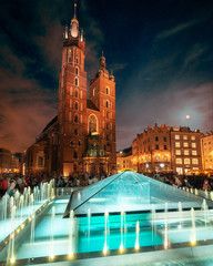 The church in the old town square in Krakow Poland at night sky