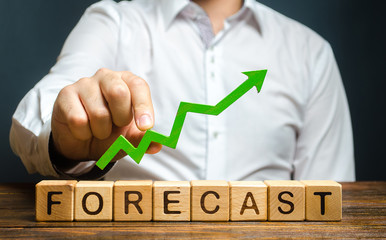 Man holds green arrow up over word Forecast. Prediction of profit growth, value of assets and...