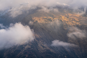 mountain view in himalayas annapurna base camp with cloud and sunlight
