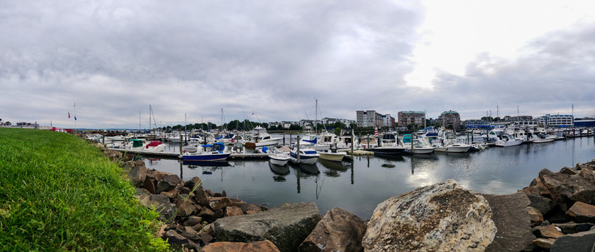 Rocky pier on a cloudy day - Panorama view of Harbor View, Stamford City, Connecticut