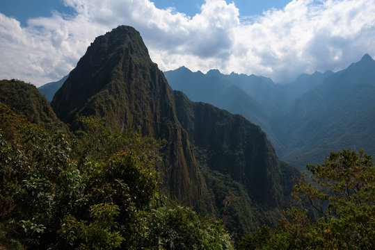 The famous and characteristic peak of Huayna Picchu seen from Machu Picchu, Peru