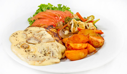 Peri peri Chicken with Button mushroom gravy, Saute Vegetables, Spicy fried Potatoes with Tomato Lettuce Salad.