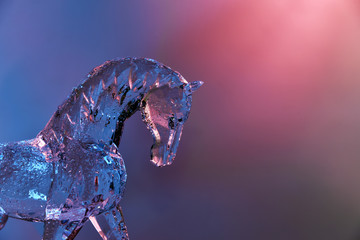 Crystal horse in drops of dew