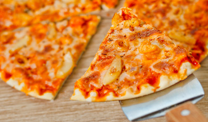 Classic Seafood Pizza with spicy chilli sauce.