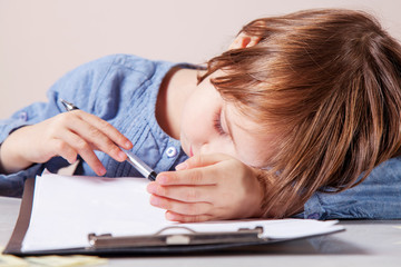 I hate my office work. Business child girl going crazy with work with documents.