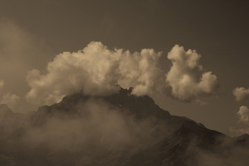 Obraz na płótnie Canvas Mountain And Clouds