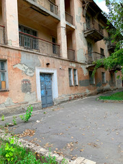 Fototapeta na wymiar Old facade of a residential building.