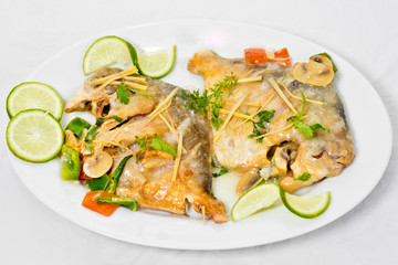 Pomfret fish pieces on plate, spicy Indian dish. Popular amongst Bengalis and south Asia for it's taste.