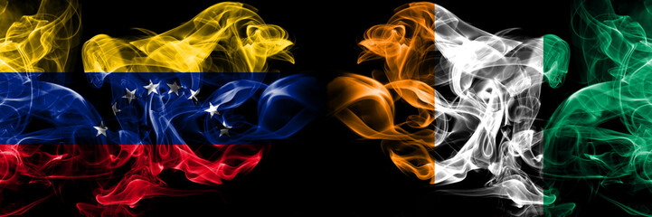 Venezuela, Venezuelan, Ivory Coast smoky mystical flags placed side by side. Thick colored silky smokes flag concept