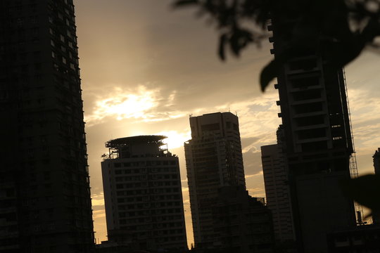 sun rays over buildings