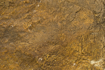 Rock plate. Colored stone surface. Wall of the house. Geology and Metamorphic rocks.