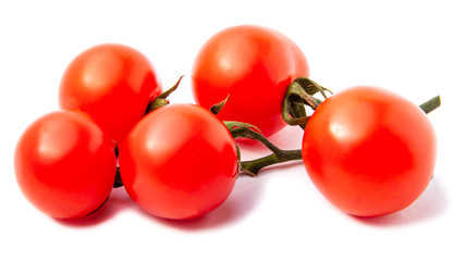 Close-up view branch of Fresh red cherry tomatoes with green leaves isolated on white background.