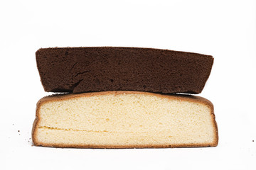 Sliced bread showing good texture of chocolate and vanilla cake