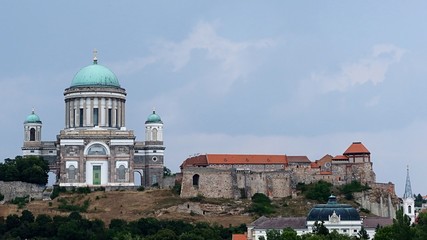 Fototapeta na wymiar Primatial Basilica of the Blessed Virgin Mary Assumed Into Heaven and St Adalbert and Esztergom Castle as viewed from Maria Valeria bridge between Sturovo and Esztergom.