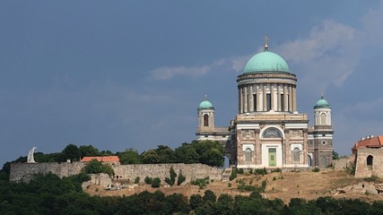 Primatial Basilica of the Blessed Virgin Mary Assumed Into Heaven and St Adalbert and  Esztergom Castle as viewed from Maria Valeria bridge between Sturovo and Esztergom.