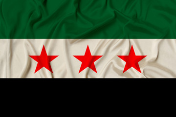 beautiful photograph of the national flag of the Syrian opposition on delicate shiny silk with soft...
