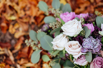 Beautiful wedding colorful bouquet for bride. Beauty of colored flowers. Close-up bunch of florets. Bridal accessories. Female decoration for girl. Details for marriage and for married couple