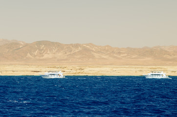 White pleasure boat on the background of the nature reserve of the Ras Muhammad