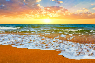 beautiful summer sandy sea beach scene at the sunset