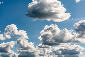 White, Fluffy Clouds In Blue Sky. Abstract Background From Clouds.