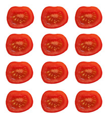 A set of cut red tomatoes in rows on a blank background