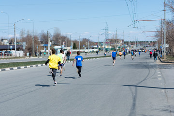 Ulyanovsk, Russia - April 20, 2019: annual city spring marathon. Sunny day. Healthy lifestyle. City relay.