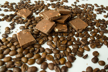 love for coffee grains and milk chocolate on a white background