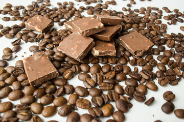 love for coffee grains and milk chocolate on a white background