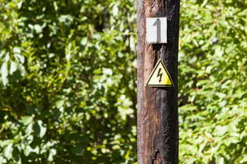  sign on a summer pillar on a background of nature