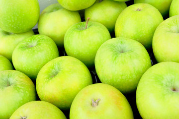 Fototapeta na wymiar Green apples, fruit close-up, top view. Healthy food, diet concept. Organic fresh product.