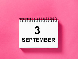 Calendar book date pink background 3 September