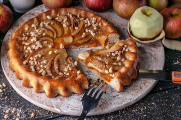 Still life: homemade pie with apples and peaches. Close-up