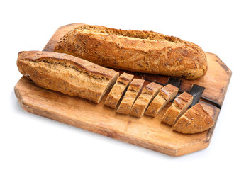 Wooden board with tasty bread on white background